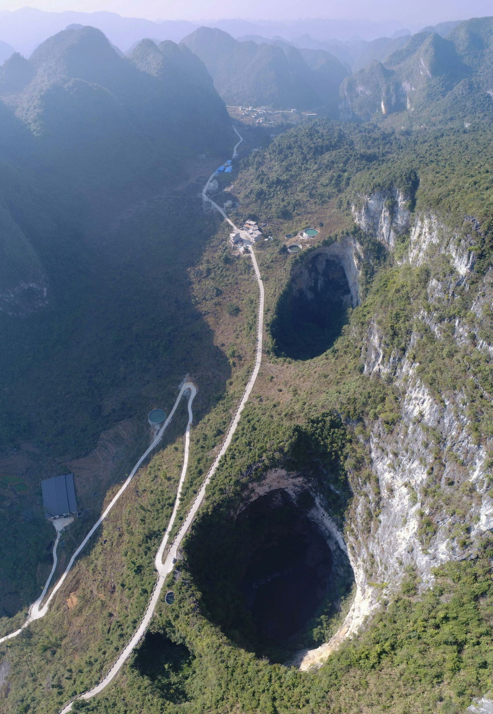 Scientists Keep Finding Giant Sinkholes In China That Hide Ancient ...